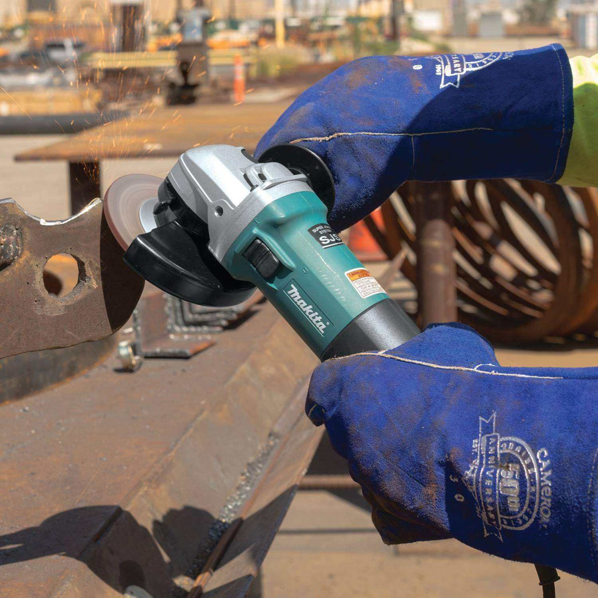 mua-may-mai-makita-1